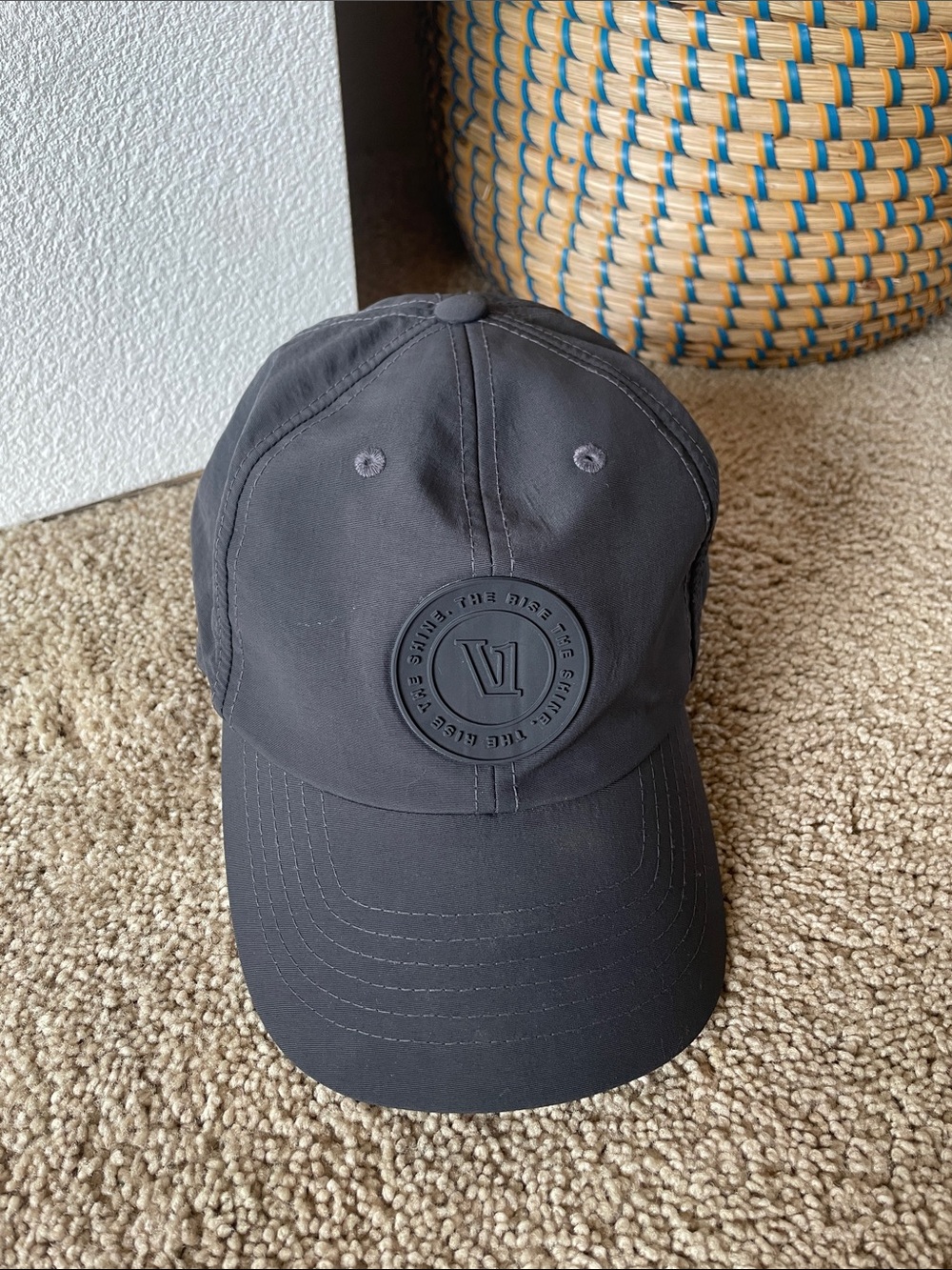 Vuori Charcoal Gray Baseball Cap with Circular Logo Patch Neutral Minimalist